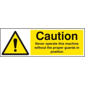 Caution - Never Operate Machine without Proper Guards Caution - Never Operate Machine without Proper Guards